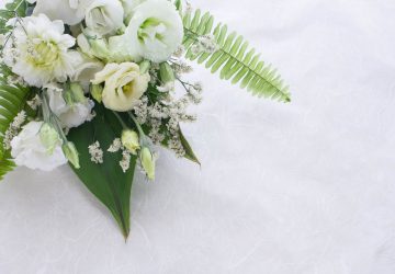 White funeral parlour flowers.