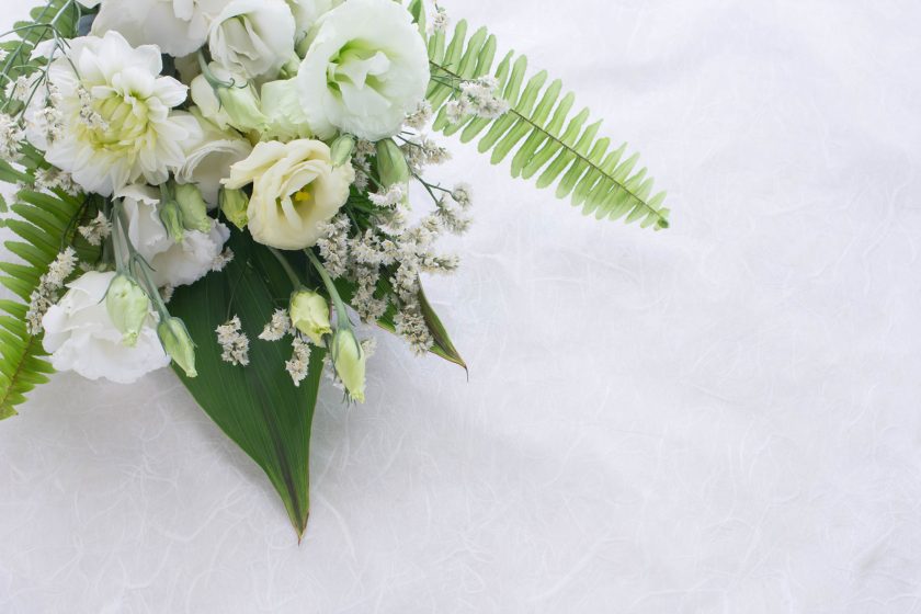 White funeral parlour flowers.